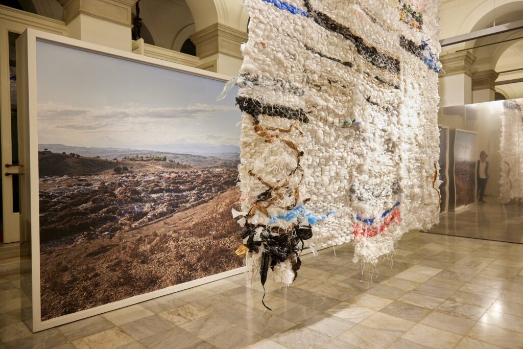 Making Something out of Nothing, Austrian Cultural Forum Istanbul (Palais Yeniköy), 2024. Woven plastic carpet and aerial prints in the corridor.