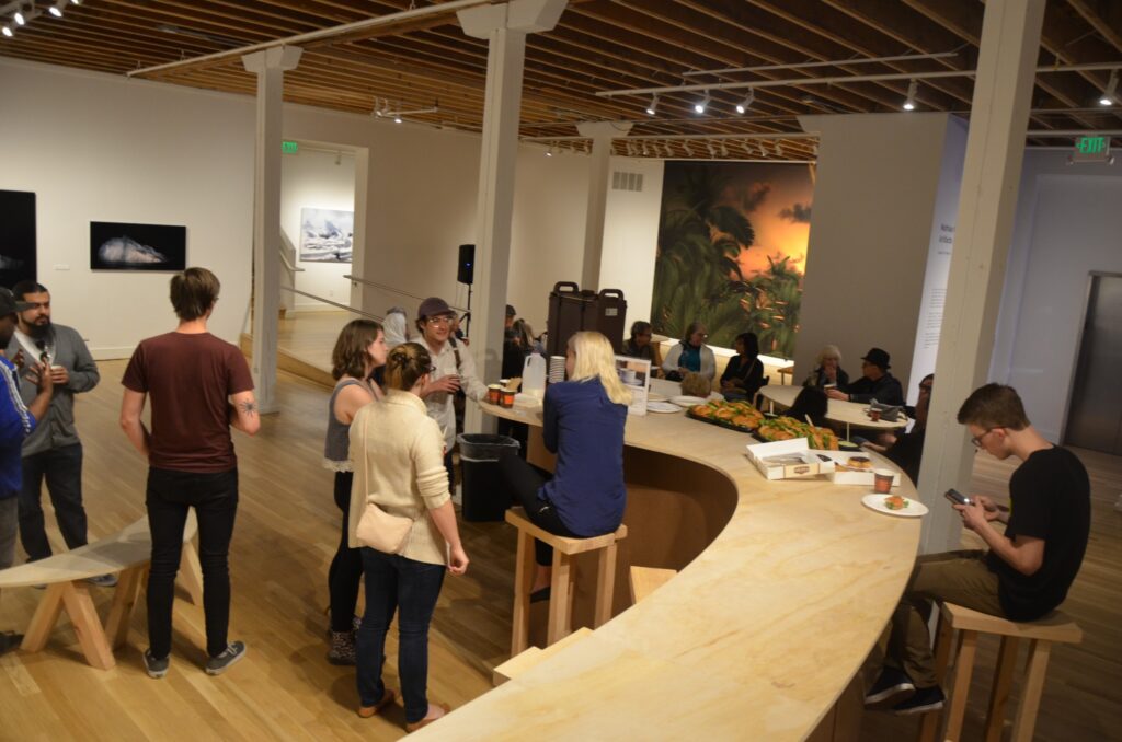 Visitors with drinks, Cultural Cul-de-sac, BMoCA Boulder, 2017