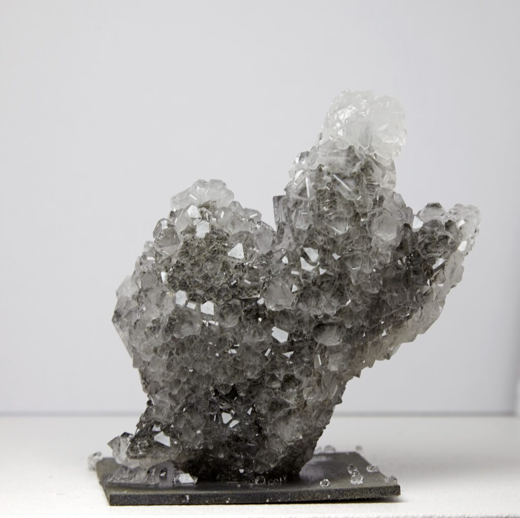 Mathias Kessler, Model for Future City’s, 2019. 3D-printed honeycomb structure with crystal growth (growing architecture), ca. 12 × 7 cm (varying dimensions). Unique.