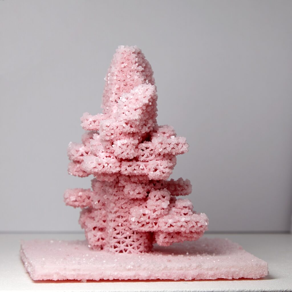 Mathias Kessler, Model for Future City’s, 2019. 3D-printed honeycomb structure with crystal growth (growing architecture), ca. 12 × 7 cm (varying dimensions). Unique.