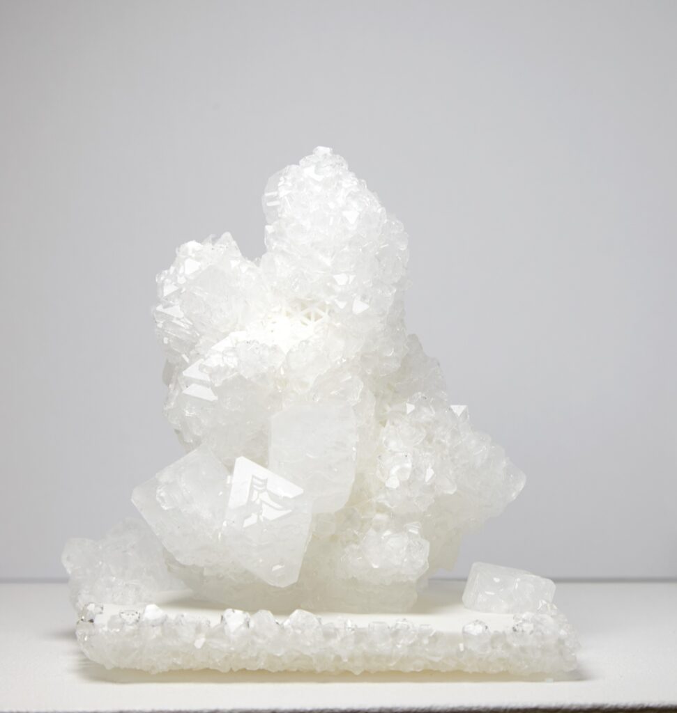 Mathias Kessler, Model for Future City’s, 2019. 3D-printed honeycomb structure with crystal growth (growing architecture), ca. 14 × 12 cm (varying dimensions). Unique.