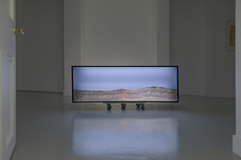 Mathias Kessler, Mars. Calypso Crater, 2011 (light box), installation view, Austrian Cultural Forum London, 2022.