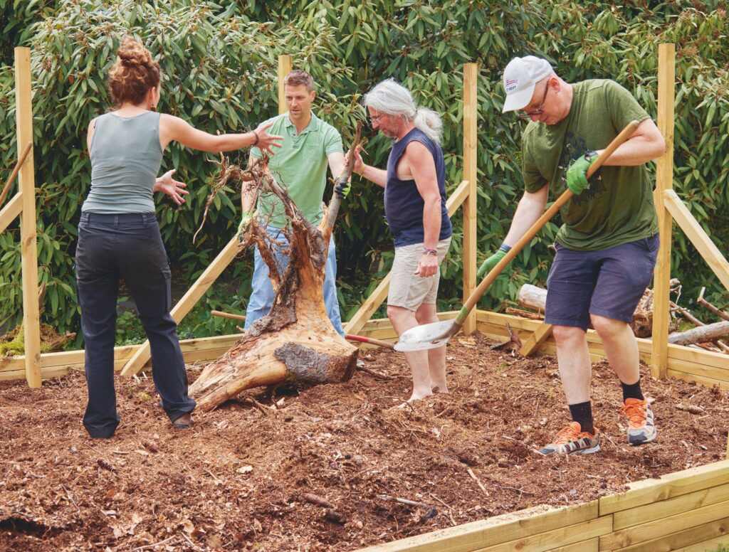 Participants building the sculpture